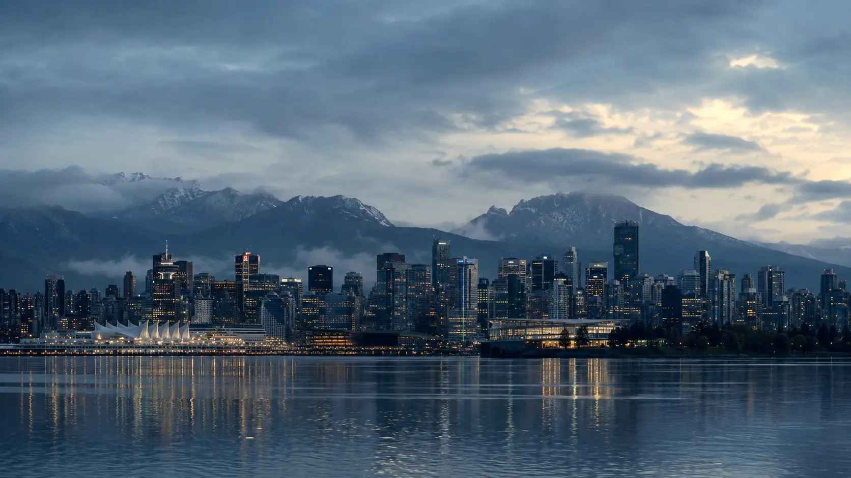 Vancouver skyline and North Shore mountains at blue hour